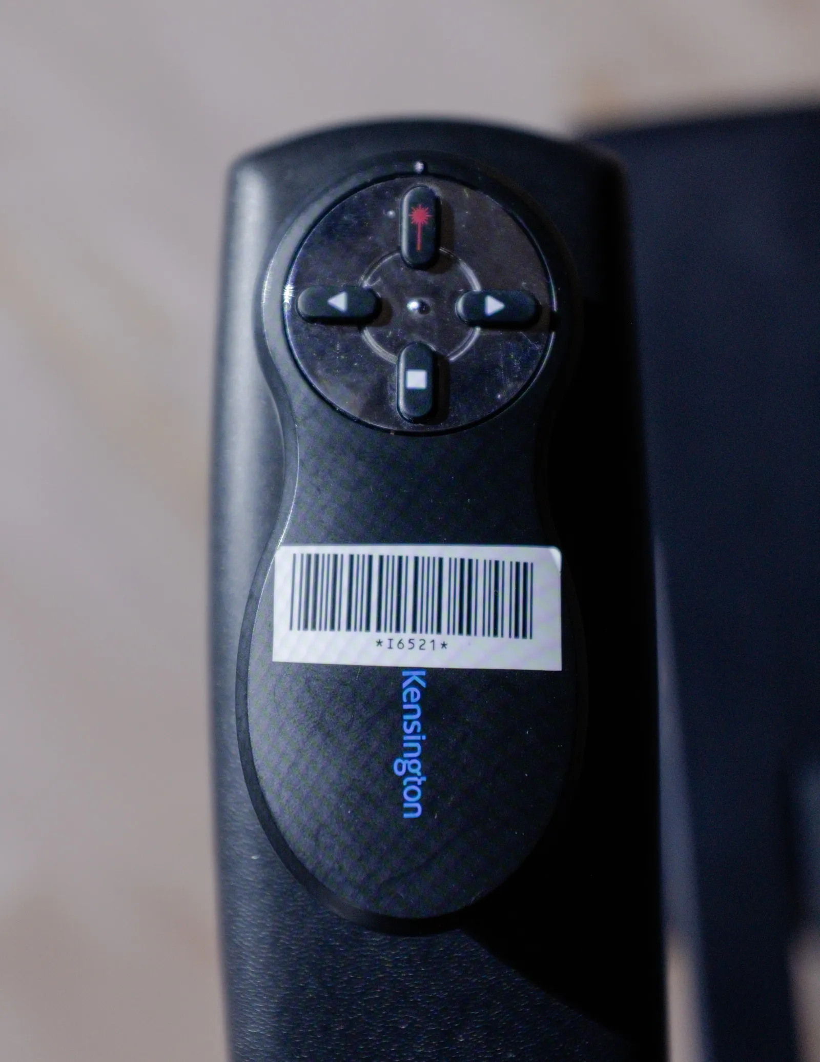 A presenter’s remote is remapped to control the game interface.
